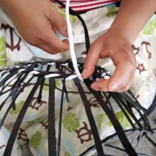 local artisan handweaving the ace cat tree baskets